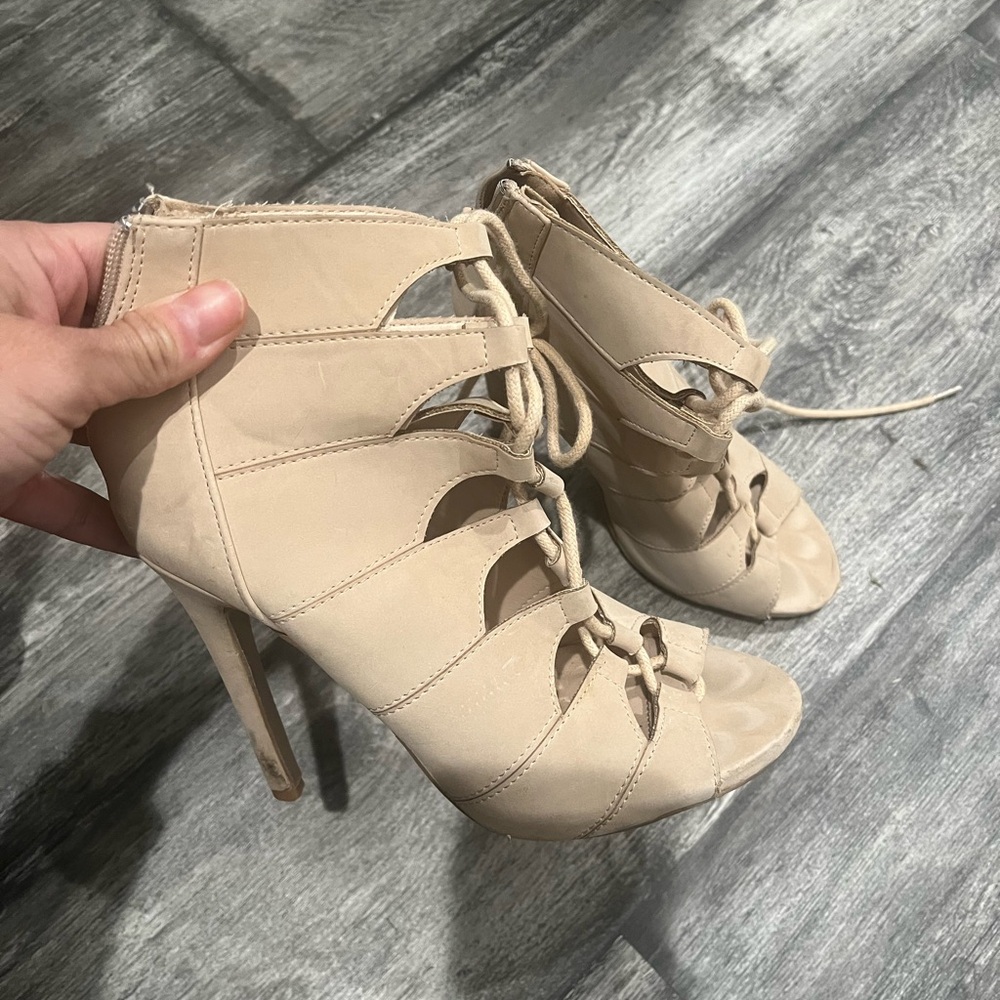 Cream colored laced up heels !